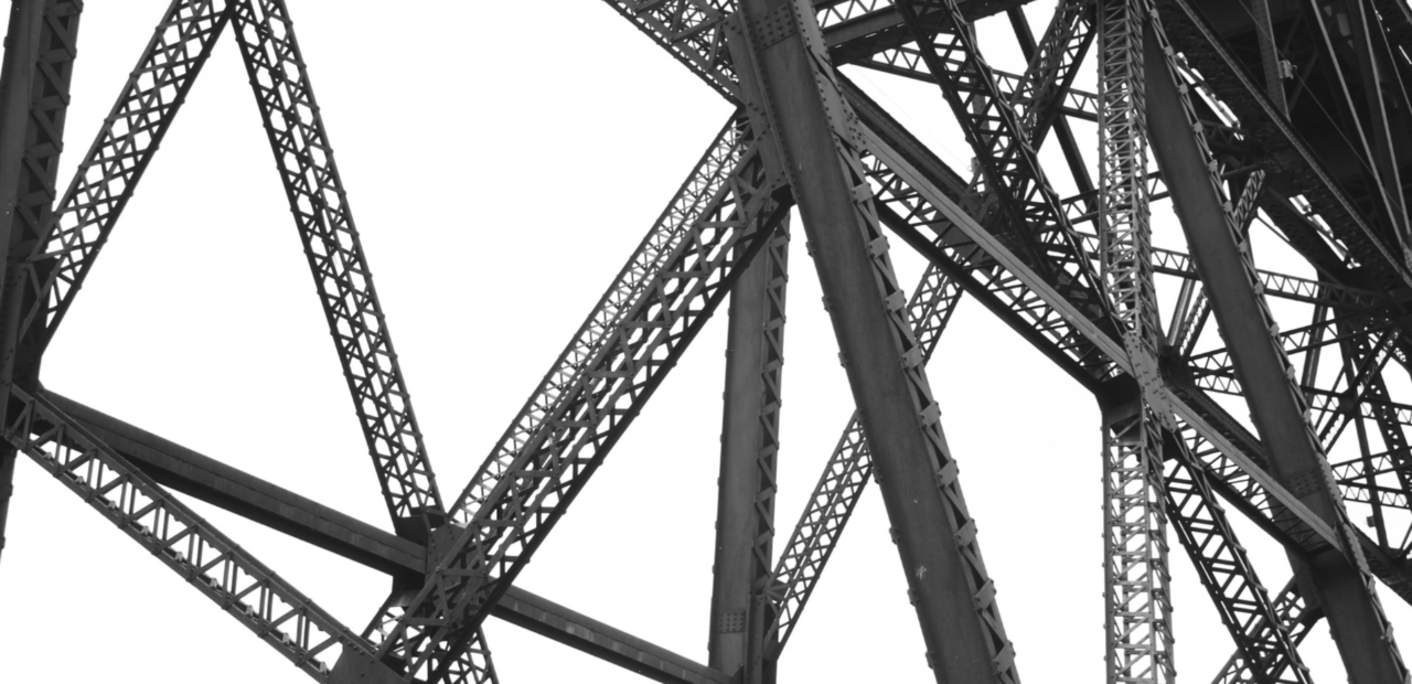 Close-up monochrome image of the intricate metal framework in add-on tools for E3 to improve your efficiency