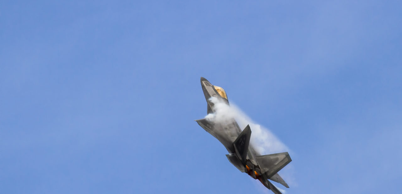 High-speed stealth fighter jet mid-flight demonstrating agility and speed, symbolizing advanced DDR4 technology capabilities