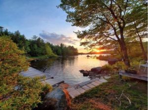 Sunset over a lake in the New Hampshire mountains. Meet Shawn, senior technical fellow at Zuken.