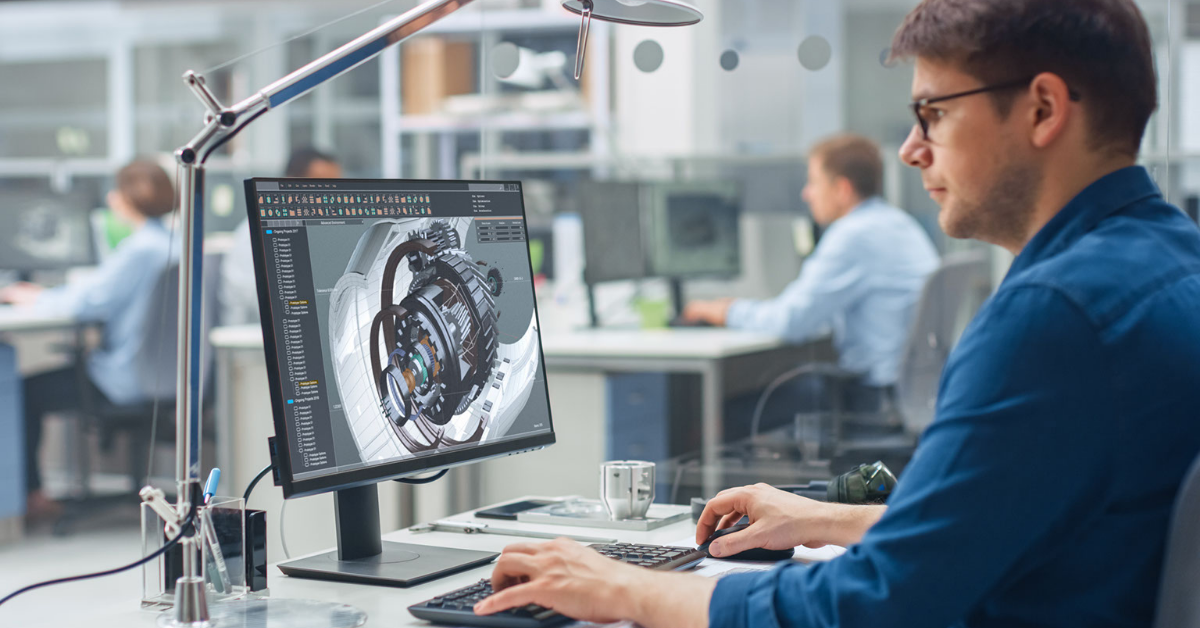 Engineer working on MCAD software designing complex mechanical systems, demonstrating the integration of mechanical and electrical CAD