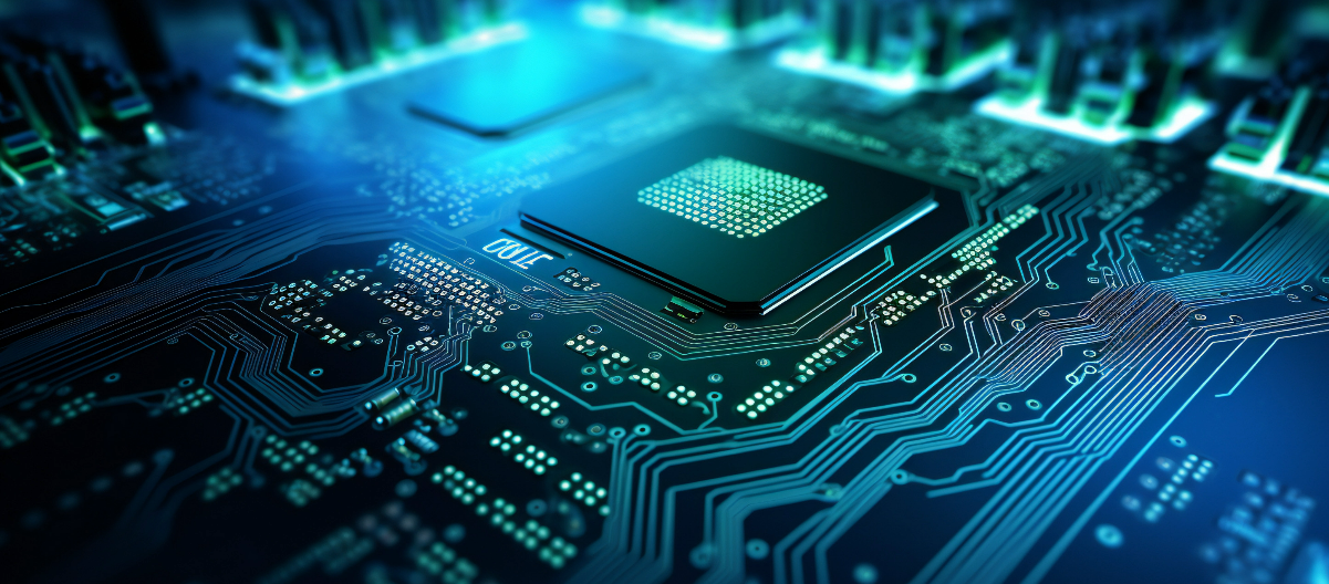 A close-up image of a printed circuit board (PCB) highlighting a central microchip and the complexities of PCB design and the precision required for effective placement and routing.