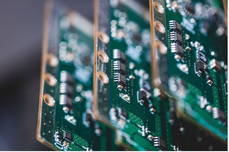 3 PCBs stacked side by side. PCB Industry Trends.