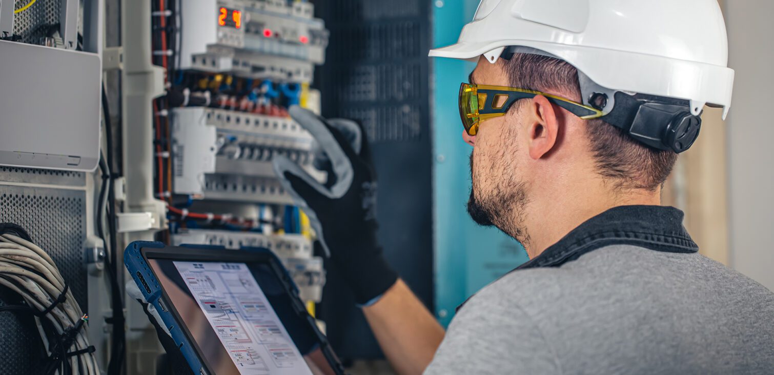 Engineer working on an electrical panel