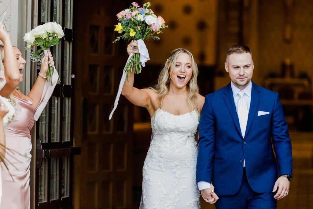 Bride and Groom celebrating after tying the knot.